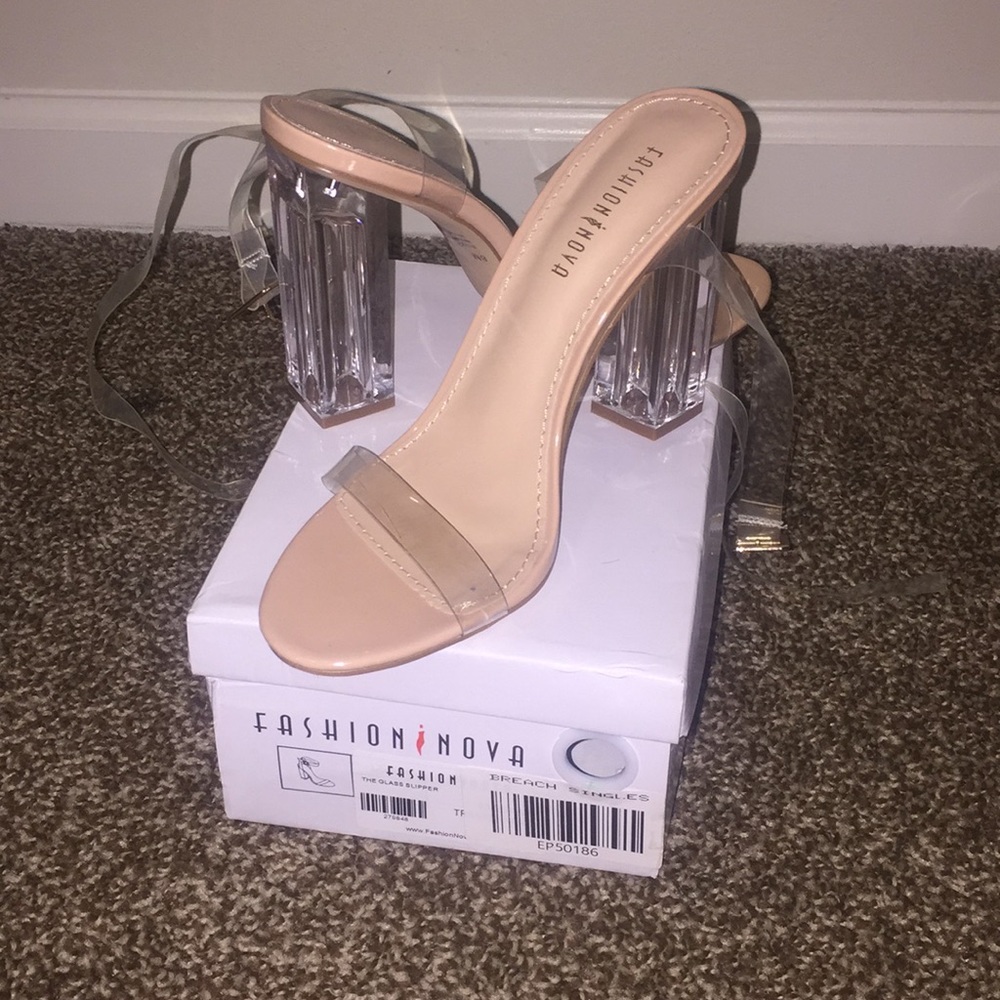Clear heels. NEVER worn comes with original box